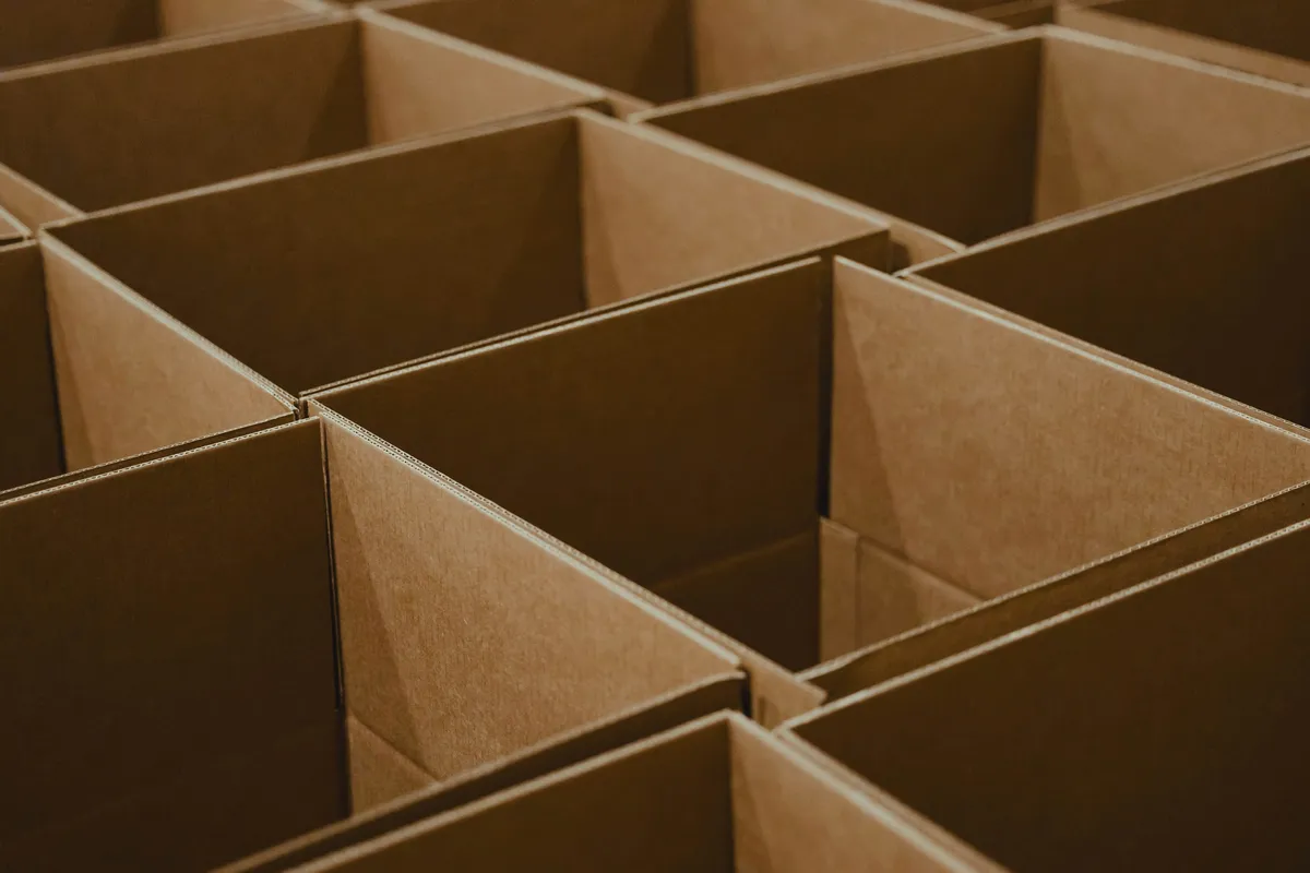 Rows of open cardboard shipping boxes ready for packing